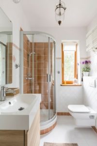 bathroom with an orange shower