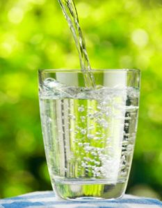 Water being poured into a cup