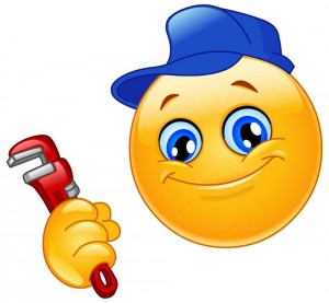 smiley face wearing a hat and holding a wrench