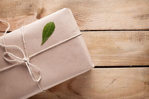 Package wrapped up in brown paper and string