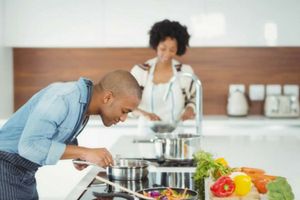 Man and woman cooking in the kitchen