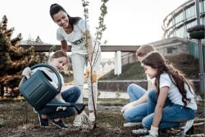 family planting a tree