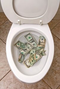 Money in a toilet bowl