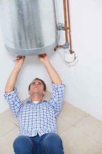 Man working on a water heater